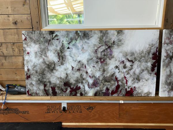 Abstract smoky art with hints of red and purple.