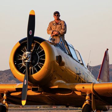 Your pilot, Karl Gashler, standing in the front cockpit of the T-6 Texan WWII warbird