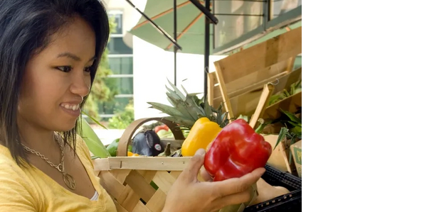 A woman looking at produce