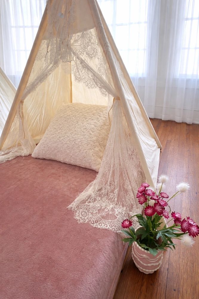 Luxury teepee sleepover setup for a birthday party