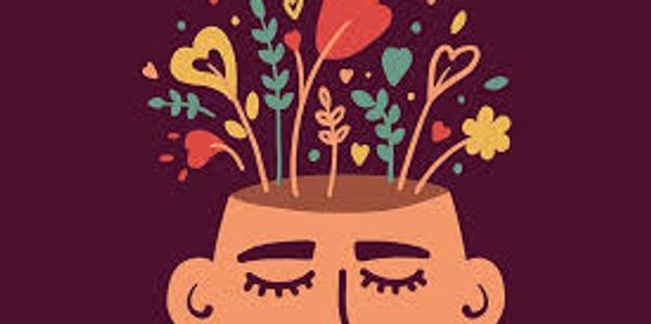 A colourful image of a person's head  bursting with colours and shapes) 