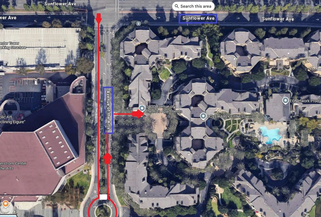Aerial view of Avenue of the Arts and Sunflower Ave intersection with apartment complex and parking.
