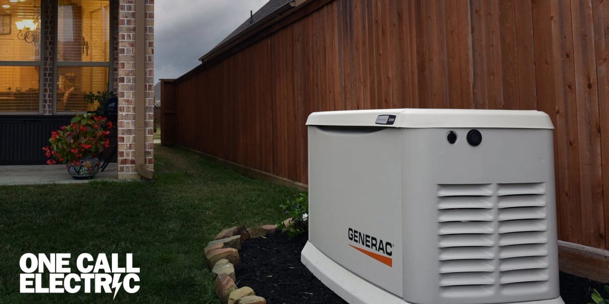 Generac home standby generator installed outdoors by a wooden fence.