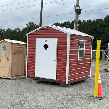 Security building with a portable toilet 