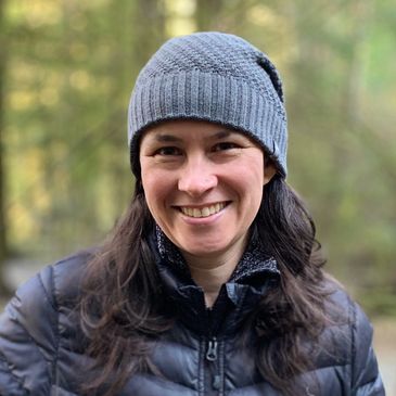 Vanessa Senecal smiling in the forest.