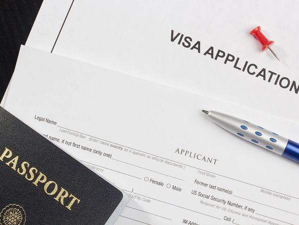 a passport on a wooden table