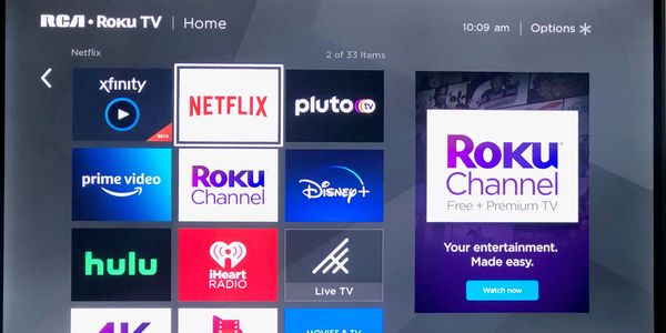 RCA Roku TV home screen showing various streaming apps like Netflix and Disney+.
