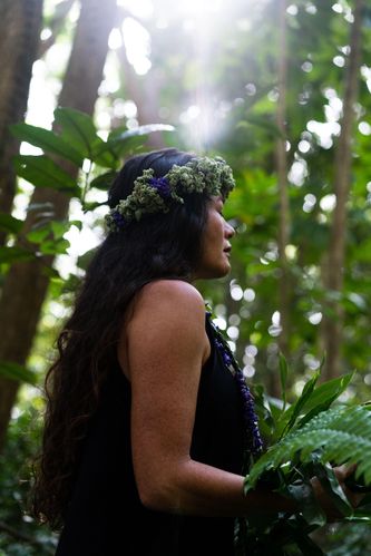 Inside the Makaleha Mountains, on the edge of the falls, a ritual of asking permission to enter
