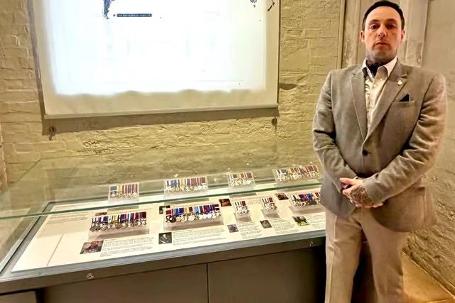 Andrew Radford CGC standing beside the Household Cavalry Gallantry Medalists of the two regiment's  