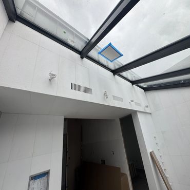 Vent slits cut into custom marble tile. 