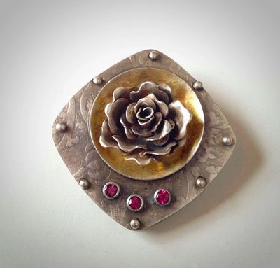 Rose pendant with sterling silver, 24k keum-boo gold, and three faceted garnets