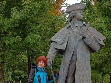 Women with statue of John Adams in Quincy, Massachusetts