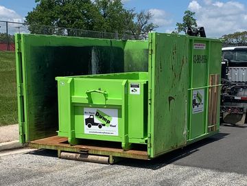 10 yard dumpster placed inside 20 yard dumpster for 30 combination dumpster. 
