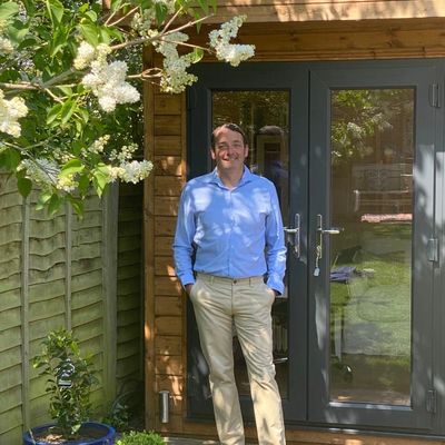 A picture of me outside in my garden. A place of piece and sanctuary. 