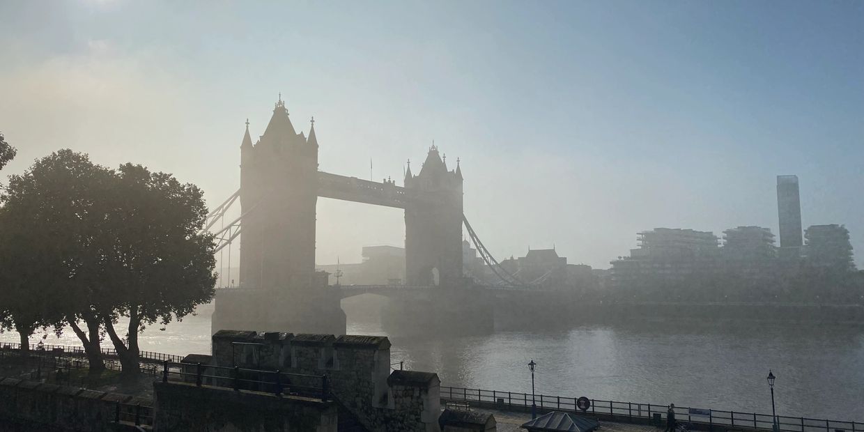 Tower Bridge in the morning mist taken from the Tower of London ramparts.