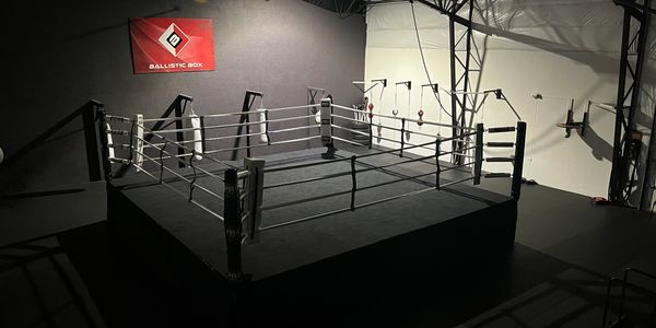 Wide view of the boxing ring and training space inside Ballistic Box gym in Portland, Oregon.
