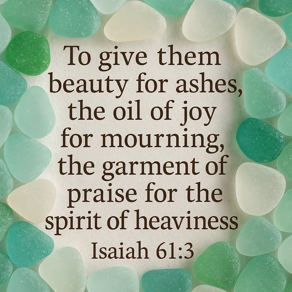 Inspirational Bible verse Isaiah 61:3 surrounded by sea glass.