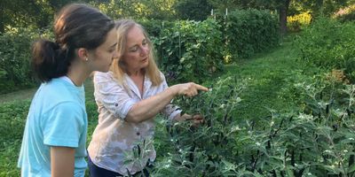 Mary with a teenage girl in the garden