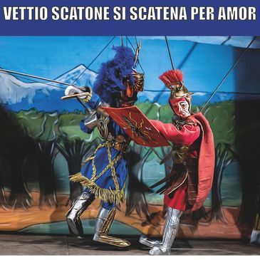 Two traditional armored puppets in an intense fight scene with a scenic backdrop.