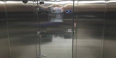 Metal walk-in cooler door.