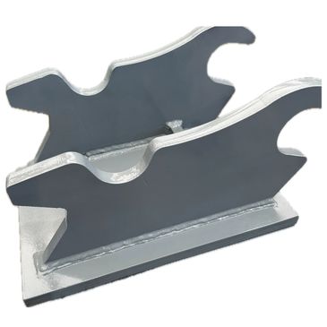 Gray metal pipe or rod holder with curved slots and welded base.