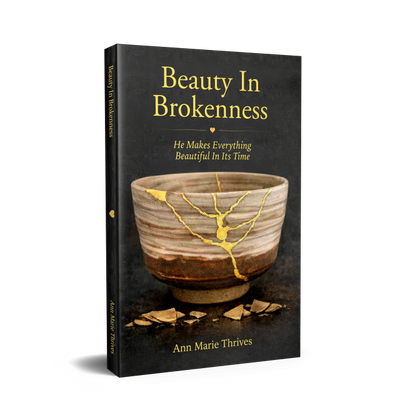 Book titled 'Beauty In Brokenness' with a cracked pottery bowl on the cover.