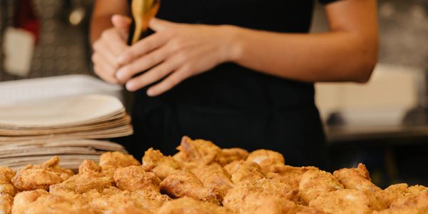 Serving our fried chicken at a picnic themed wedding