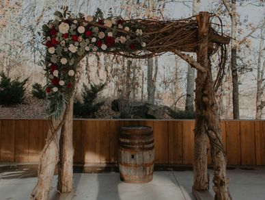 Arch adorned with wood flowers