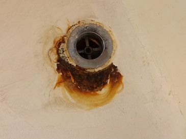 PORCELAIN BATHTUB RUSTING AROUND THE DRAIN