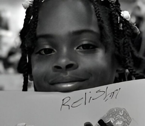 Black and white portrait of smiling girl.
