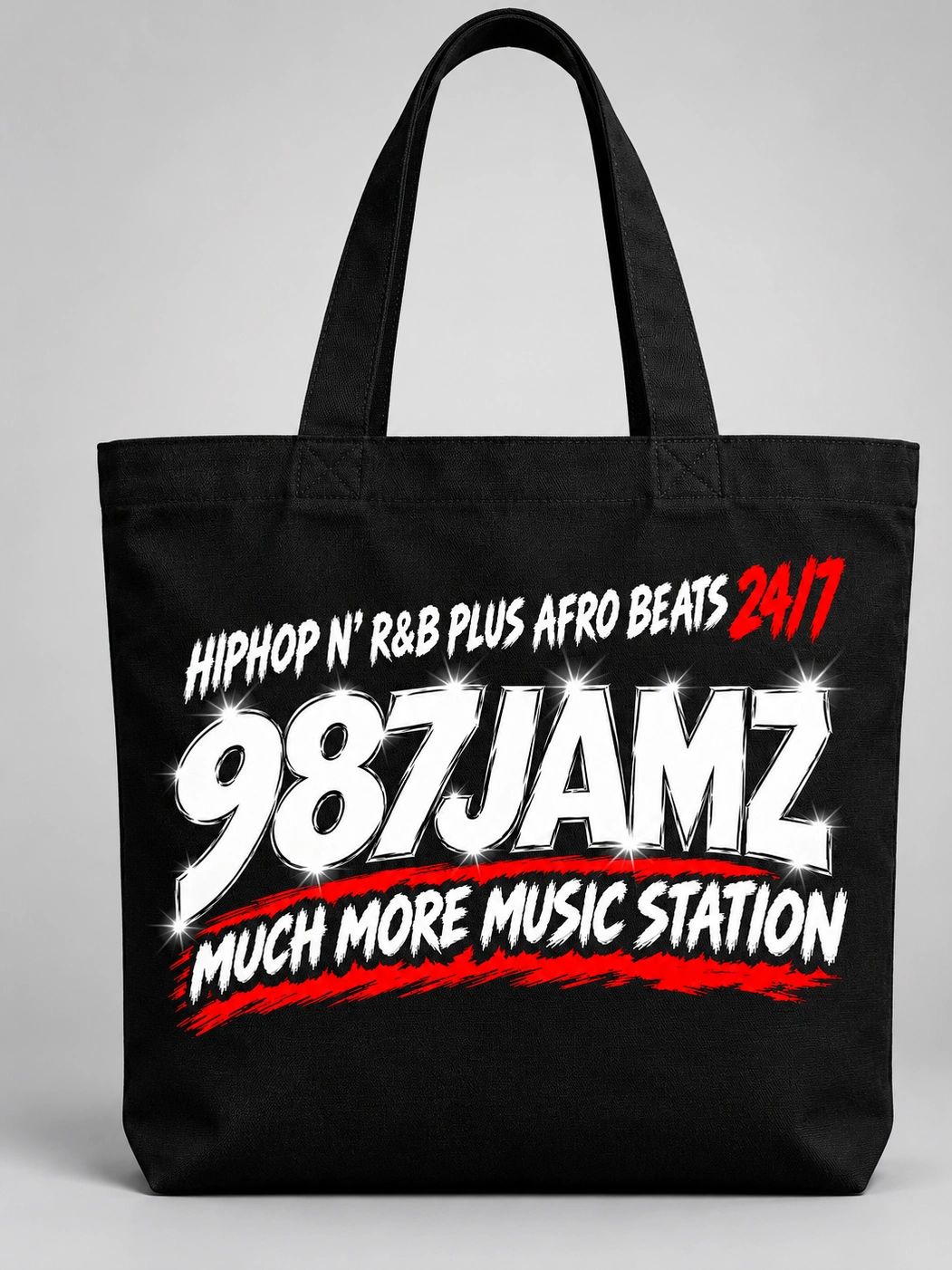 Black tote bag with bold music station logo and text.