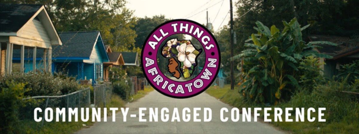 Community-engaged conference banner with Africatown logo.