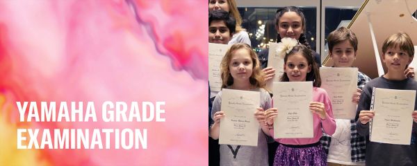 Children proudly holding Yamaha Grade Examination certificates.