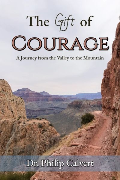 Book cover showing a canyon trail with the title 'The Gift of Courage'.