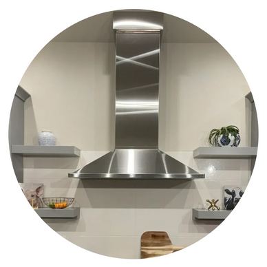 48" Thermador wall mount hood with custom chase and trim. 