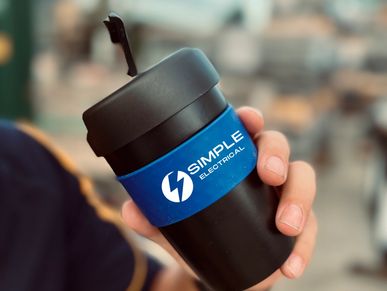 Simple electrical. black reusable coffee up with blue band, and 2 colour screen print.
tradie. 