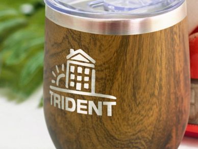Laser Engraving decoration uses lasers to engrave or mark an object.  Engraved logo on a coffee cup.
