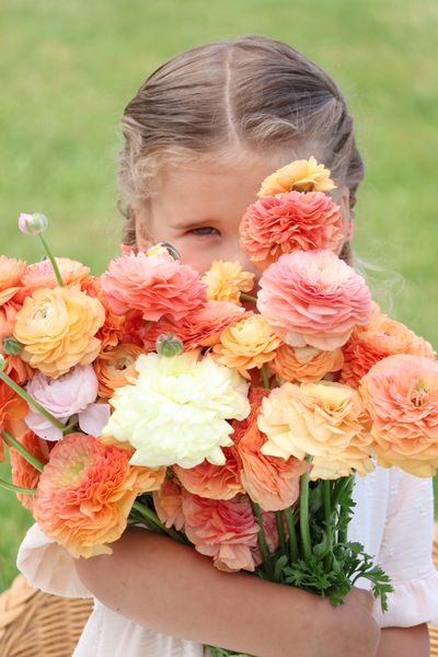 Girl holding flowers