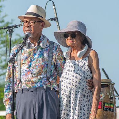 Dr. George and Mrs. Barbara Henderson speaking at the 2023 Norman Juneteenth Festival. 