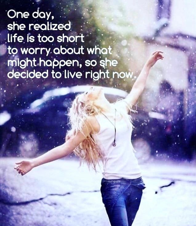 Woman embracing life in the rain with an inspirational quote.