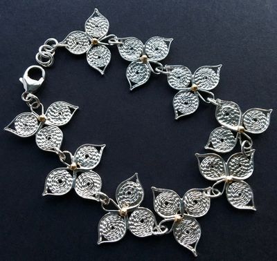 Fine filigree silver Three Leaf Clover bracelet with brass granules. 