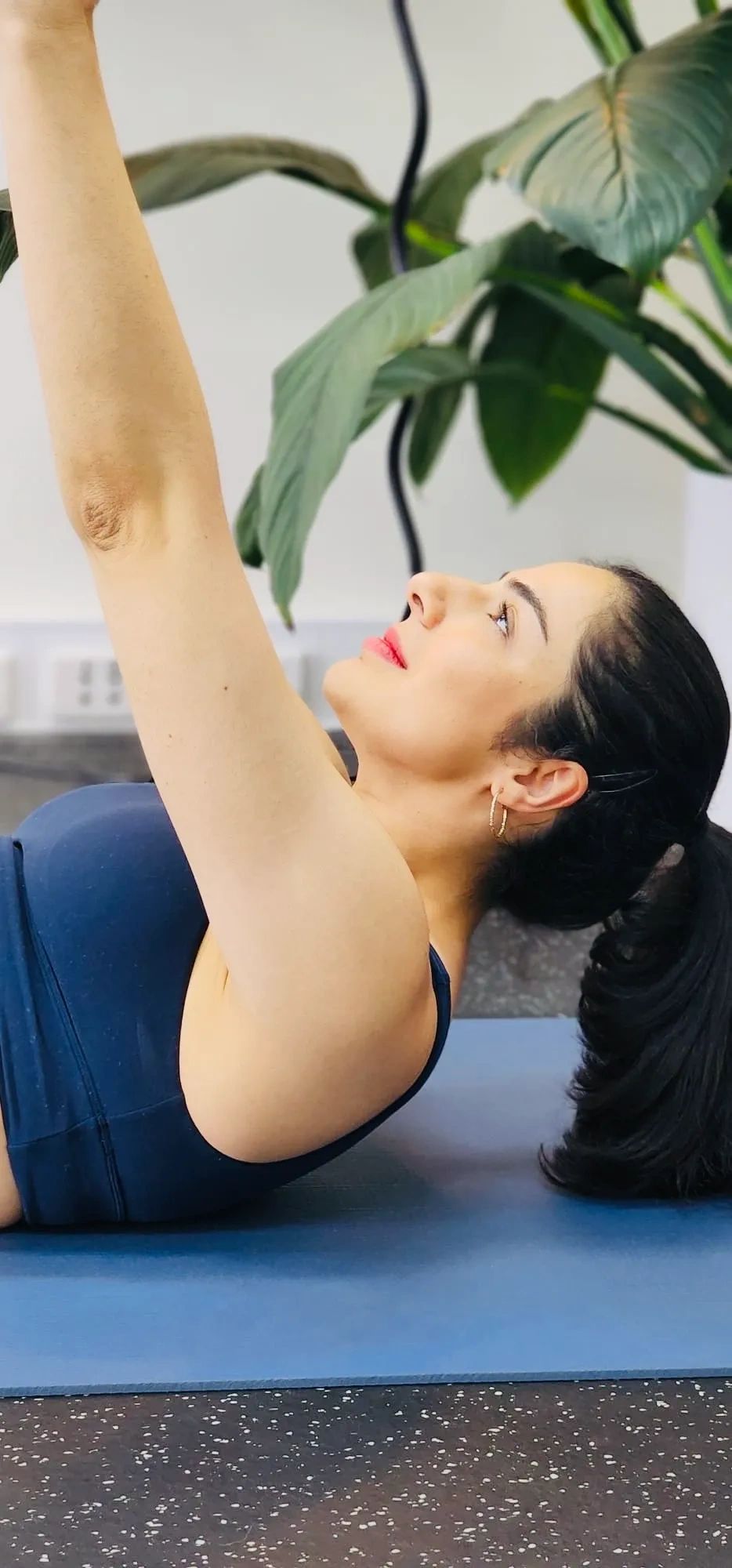 Fifi on her back in a Yin Yoga Pose