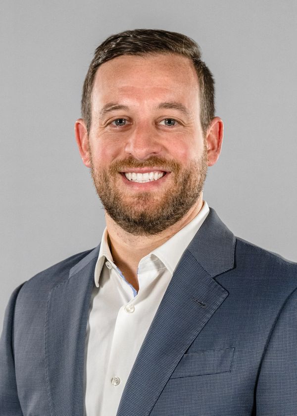 Studio Headshot of Man