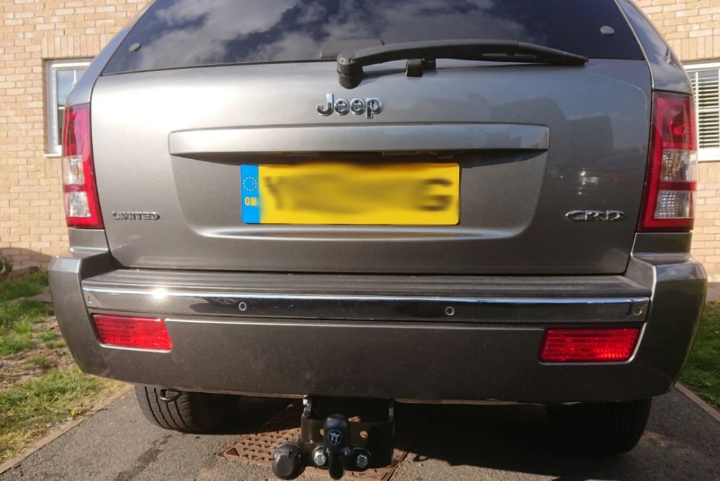 Grey Jeep Grand Cherokee fitted with a fixed Tow-Trust Tow Bar 