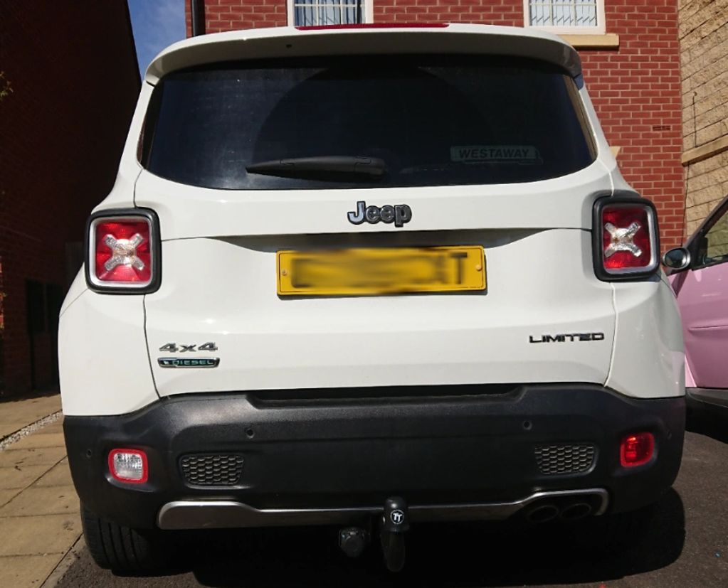 White Jeep Renegade fitted with a fixed Tow-Trust Tow Bar  