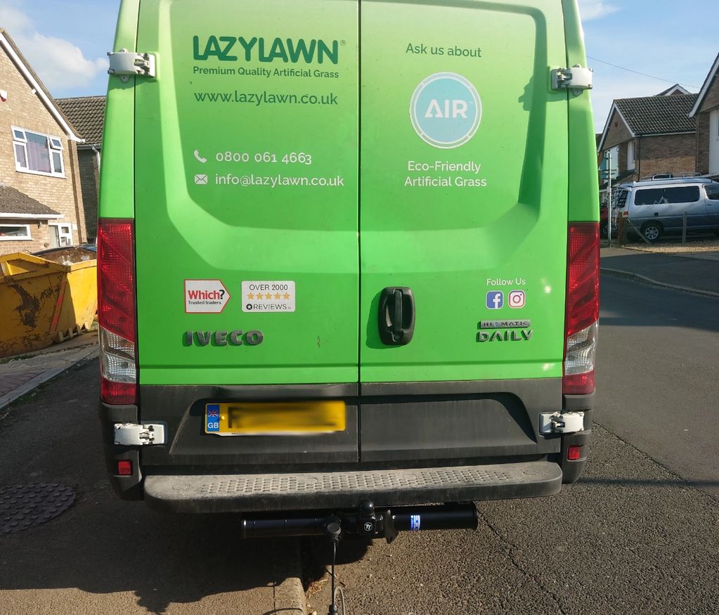 Green Iveco fitted with a fixed Tow-Trust Tow Bar 