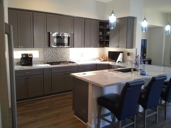 Crown Cabinets: Pioneer door style in Maple wood with Slate paint.