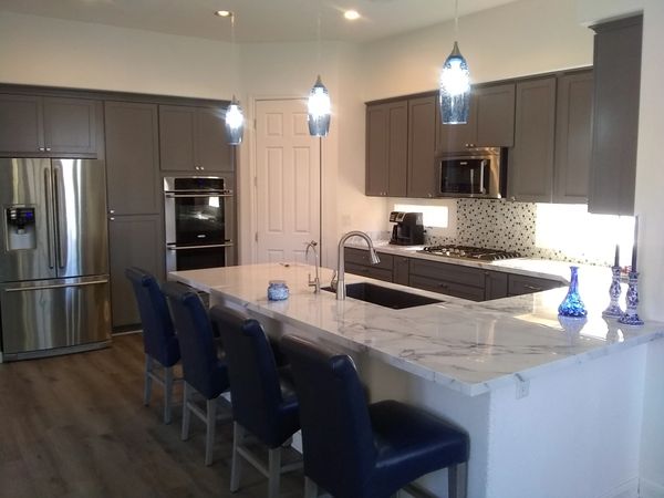 Crown Cabinets: Pioneer door style in Maple wood with Slate paint.