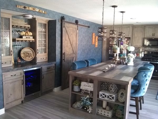 Crown Cabinets, Pioneer door style in Alder wood with Whitewash with Onyx glaze.