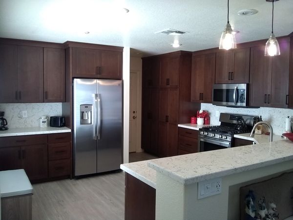 Crown Cabinets: Pioneer door style in Alder wood with Espresso stain